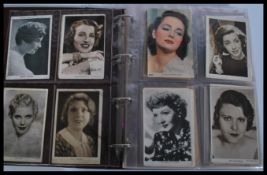 Film Star Postcards. Real photo & printed. Collection of actors and actresses in album (240). Some