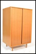 Stag Furniture C Range - A vintage retro 20th century bachelors wardrobe in light oak. The