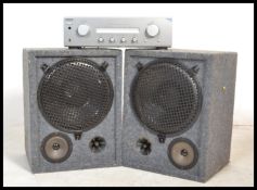 A pair of vintage retro 20th century large speakers along with a Sony TA-FE370 amplifier in original