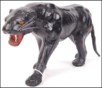 A 1920's Art Deco vintage shop advertising point of sale paper mache figure of a black panther