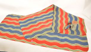 A pair of vintage 20th Century circa 1940's swimming pool Lilo's, the striking lilos having a series