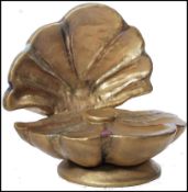 A purpose built point of sale advertising feature modelled as an oversized open clam shell,