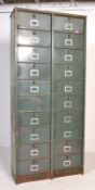 A  large Industrial mid century 20 section fall front filing cabinet of metal construction having