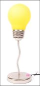 A 20th century desk / table lamp in the form a light bulb , comprising of a chromed terraced base