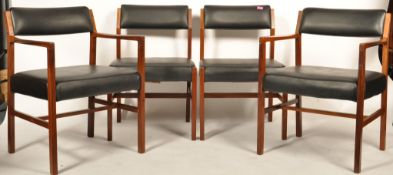 Alfred Cox - A set of 1970's retro vintage teak wood dining chairs, two of which being carvers