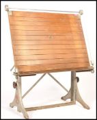 A vintage 20th Century Admel Paramount cast iron drawing board / draughtsman board, the adjustable