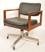 A mid century Abbess teak wood and polished steel office swivel desk chair. Raised on pointed