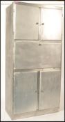 A mid 20th Century retro vintage aluminium storage upright cupboard having been bead blasted