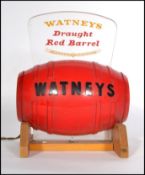 A vintage retro 20th century Watneys Draught Red Barrel