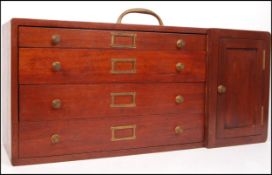 An early 20th Century vintage industrial mahogany carpenters / engineers toolbox / specimen chest