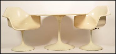 After Marcel Burke - Arkana - A mid Century retro vintage pair of fibreglass armchairs supported