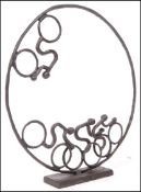 A 20th Century modernist abstract sculpture based on the Olympic cycling velodrome made from metal