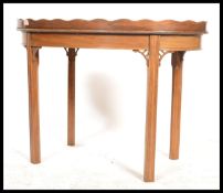 A 19th century mahogany butlers tray with gallery