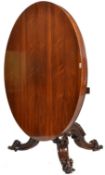 A stunning 19th Century Rosewood tilt top dining t
