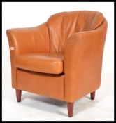 A contemporary / late 20th century tan brown leath