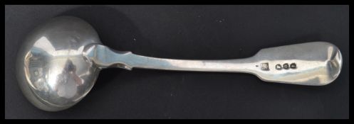 A hallmarked silver 19th century Georgian ladle in