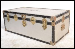 A vintage 20th Century chromed steamer trunk, poli