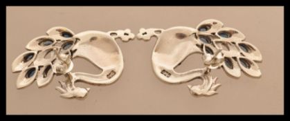 A pair of sterling silver marcasite earrings in th