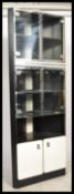 A retro 20th Century corner unit display cabinet,
