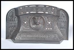 A 19th century Victorian cast iron fire guard Tidy