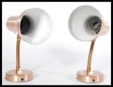 A pair of vintage mid 20th Century copper spun wal