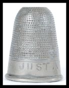 A vintage 20th Century novelty silver white metal