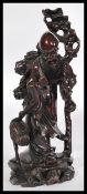 A 19th century Chinese carved hardwood figure of S