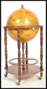 An antique style cocktail drinks globe having with