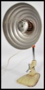 A vintage mid century Pifco heat lamp with UFO Spa