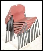 A set of 8 mid century / 1970's stacking chairs wi