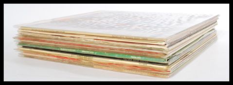 A collection of long play LP vinyl records featuri