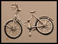 A sterling silver vintage style miniature model of