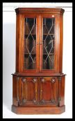 A good quality mahogany Georgian revival corner ca