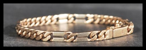 A hallmarked 9ct yellow and white gold fancy link