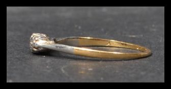 A Henry Griffith and Son 18ct gold and platinum th