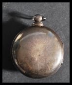 A silver hallmarked open faced pocket watch, fitte