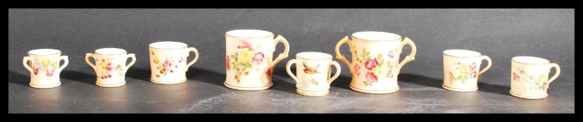 A group of eight Royal Worcester ivory blush minia