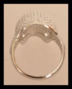 A sterling silver dress ring in the form of a skul