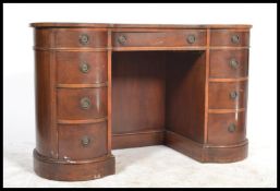 A Georgian revival mahogany kidney / lozenge shape