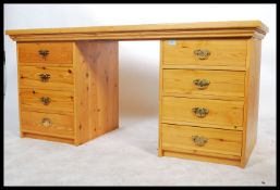 A good antique style pine twin pedestal desk. Each