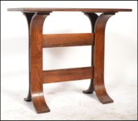 A 1970's teak wood Danish lamp - side table being