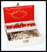 A box of ladies costume jewellery to include brooches, bangles, necklaces, chains, rings and many