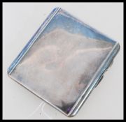 A hallmarked silver cigarette case by Joseph Gloster Ltd  hallmarked for Birmingham 1937. Weighs