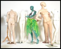 A collection of six full body vintage shop display mannequins including attached garments (please