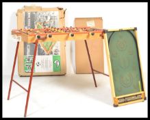 A mid century wooden vintage Bagatelle board by Kay. Of wooden construction with original painted