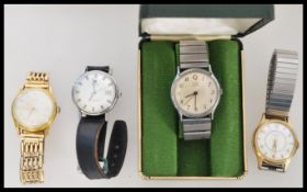 A group of three vintage watches to include a Tissot 9ct gold metal core, Ingersoll Shockproof and a