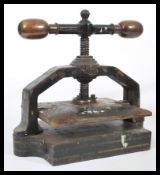 A 19th century Victorian book press by Mitchell & Co of cast iron and gun metal construction with