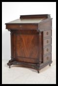 A Victorian style mahogany davenport writing desk.