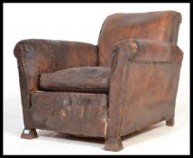 A 1930's Art Deco French club chair - armchair. Full grain original leather cushion to centre.
