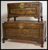 Two vintage 20th century Chinese camphor wood trunks / blanket boxes / storage chests having